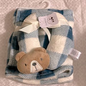 Baby’s travel blanket and neck pillow.